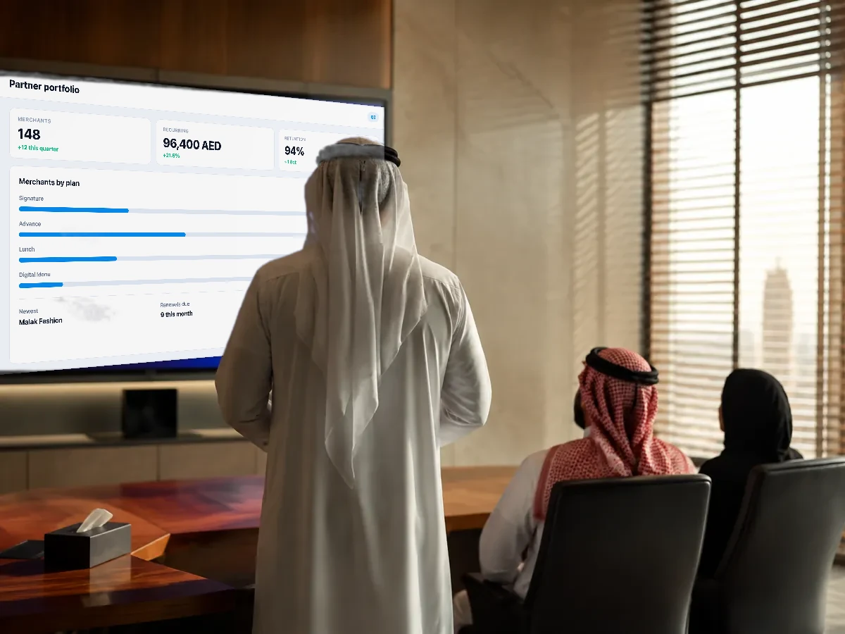 Someone presenting to colleagues in a modern meeting room